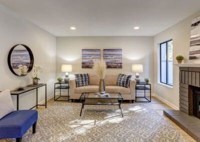 Nicely furnished living room with a fireplace