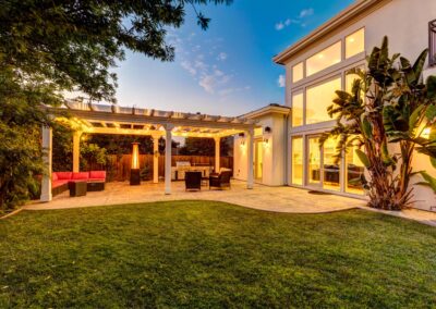 Twilight image of backyard designed for entertaining